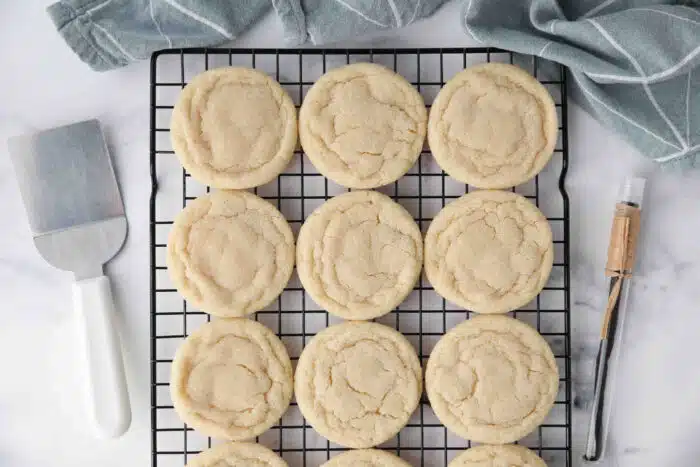 Easy drop sugar cookies without frosting cooling on a wire rack.